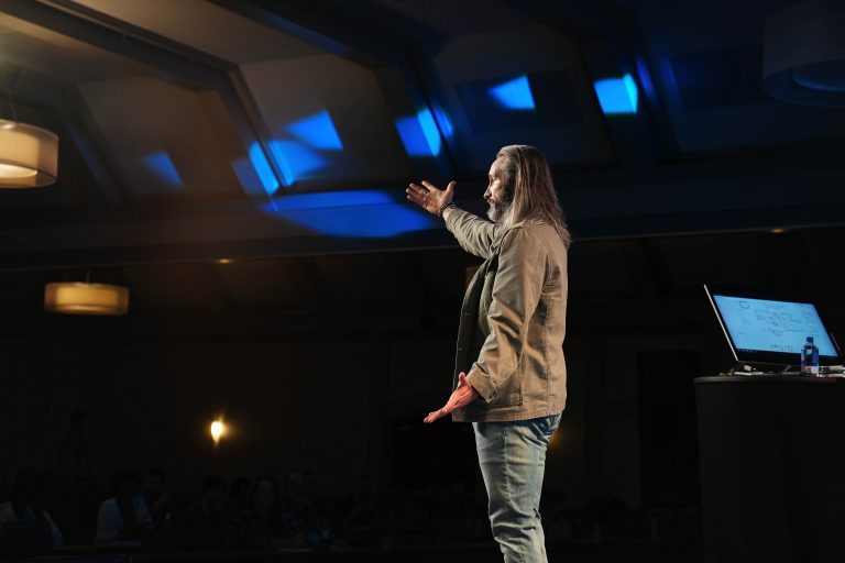 Garrett Gunderson speaking on stage on financial stewardship